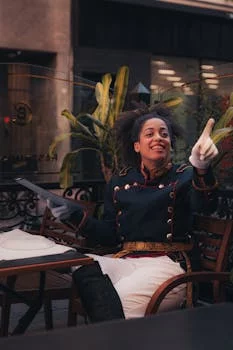 restaurant manager welcoming customers with smile